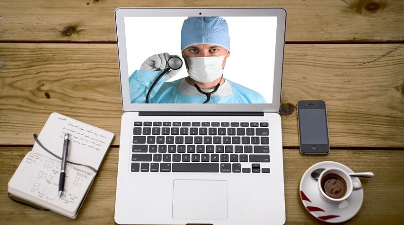 A doctor on laptop screen