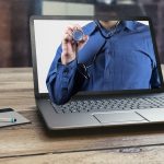 Doctor telemedicine laptop and Virtual Care Manager